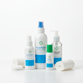 Medical wound cleanser spray bottles and saline wound wash on white background