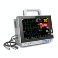 Vital signs patient monitor with color display showing ECG and SpO2 readings on white background