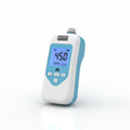 Portable handheld CO2 detector with digital display on white background