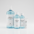 Medical ultrasound gel bottles in various sizes on white background